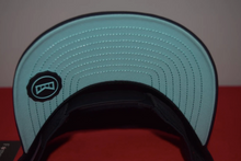 Load image into Gallery viewer, Melin Stacked Hydro Odyssey Black Aqua Snapback